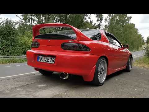 My girlfriends Mazda MX-3 V6 KLZE exhaust sound headers + catback