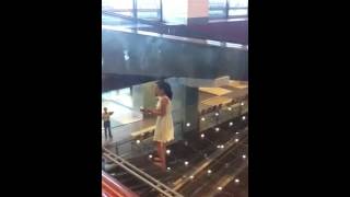 Woman damages Kinetic Rain sculpture at Changi airport