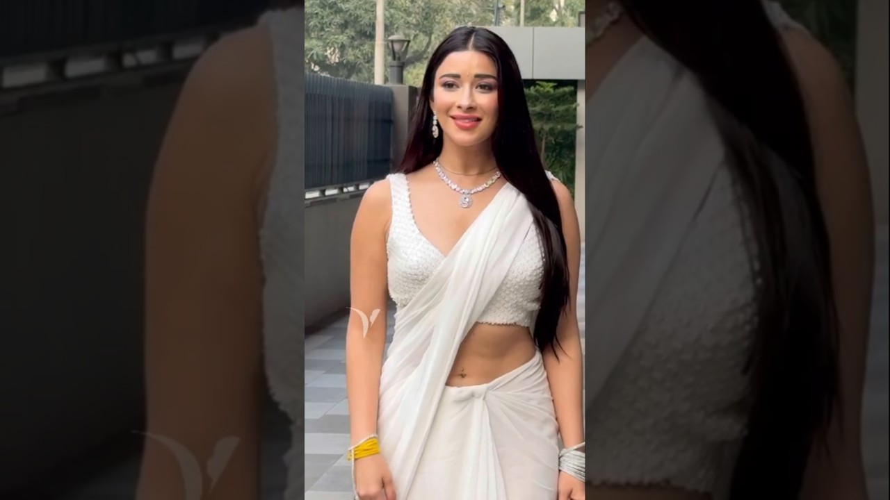 Nyra Banerjee, deep neck saree, midriff-baring saree, stunning saree look, saree fashion, celebrity saree style, glamorous saree, Bollywood fashion, Nyra Banerjee photos, saree inspiration, stylish saree ideas, elegant saree trends, saree beauty, Nyra Banerjee outfit, saree glamour