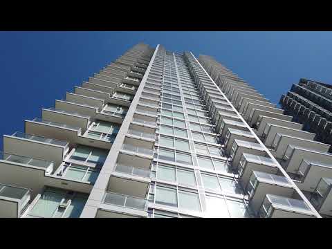 View from the Bottom of a Tall Building | Royalty Free 4K Stock Video Footage
