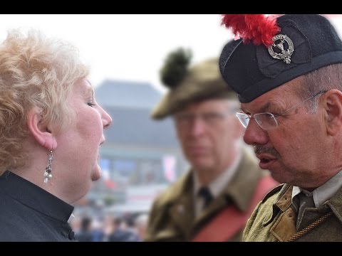 Sunset Closing Ceremony Arromanches 2016 with Reverend Mandy Reynolds and Bagpiper Hans Dubbelaar