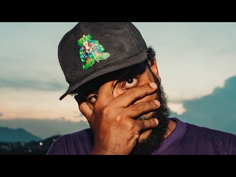 L Dolla - Uma terra iludida ( CLIPE OFICIAL )