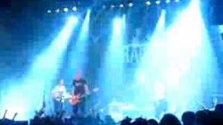 Raised Fist - Working on Wood