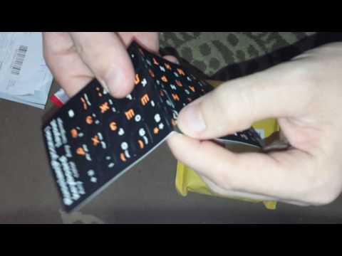 Зарядное устройство в прикуриватель, наклейка на клавиатуру, кулер охлаждения для ноутбука.