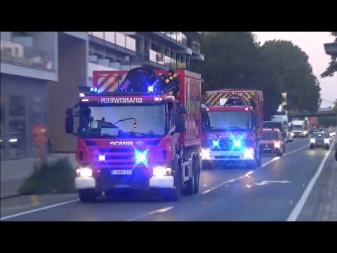 (Primeur)  brandweerwagens gent met spoed naar een ondergelopen pakeergarage in Luik