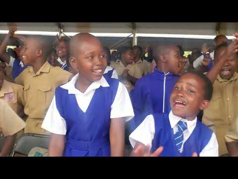 Andrea the Vocalist entertains the crowd during the Regional World Children's Day commemorations