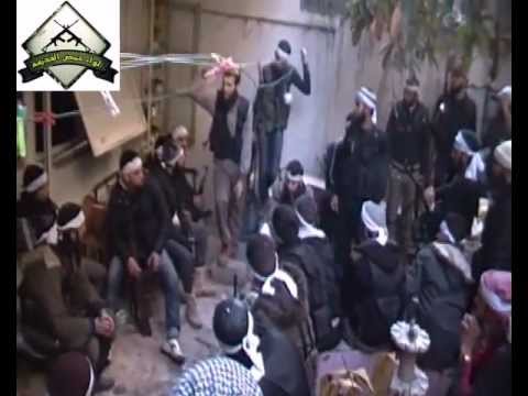 تجهيزات عناصر لواء حمص القديمة لاقتحام مقرات النظام في حي القصير في حمص