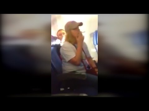 Watch This Woman Smoke A Cigarette on a Plane and Blame the Man Next To Her!