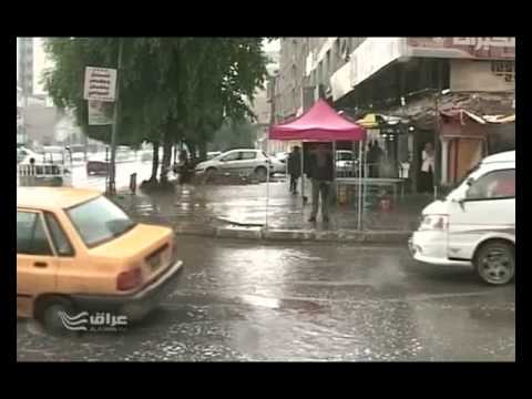 المطر يغسل وجه بغداد والشوارع تمتلئ ببرك المياه  29   10   2011