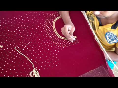 Zardosi bead work on red velvet gown