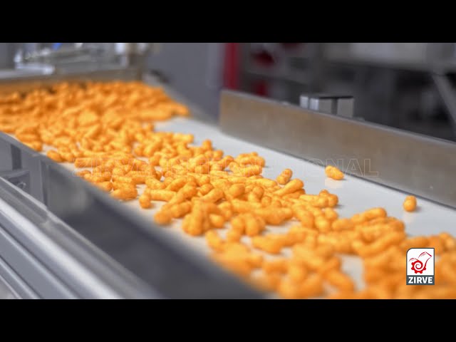 zirve extrusion | Test d'une ligne de production de Corn Puff équipée d'un système de bande transporteuse de ligne d'emballage automatique vendu à Dubaï