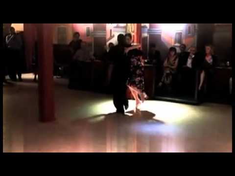  Adrian Costa  and  Amanda Costa  are  dancing  to  the  milonga  "  Silueta Portena  "