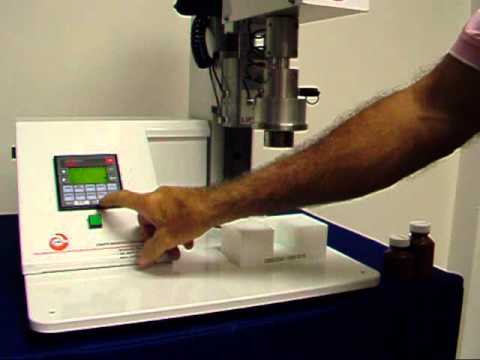 Automatic cap removal system