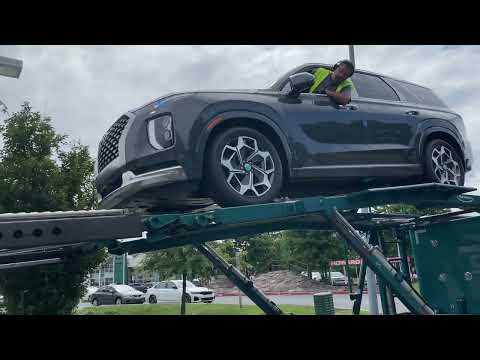 New Hyundai Palisde coming off a car carrier