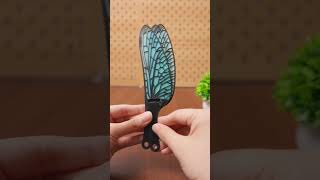 Dragonfly wings that unfold into a fan. Would you carry