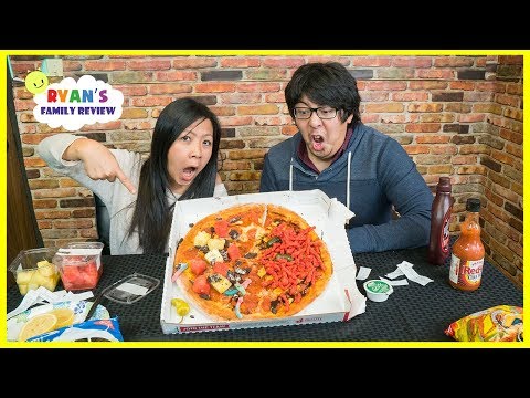 Pizza Challenge Mommy vs Daddy with Spicy Hot Cheetos and Extreme Sour Candy