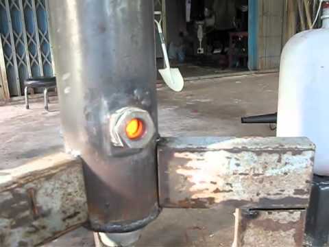 Green waste Charcoal Gasifier driving a water pump