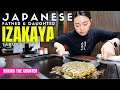 Behind The Counter At A Japanese Father Daughter Izakaya Restaurant