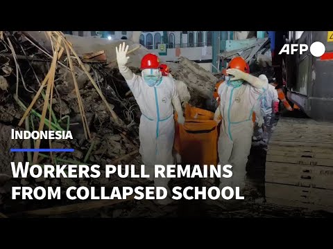 Rescuers recover bodies as death toll of Indonesia school collapse rises | AFP