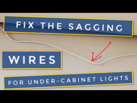 How to keep the wires for IKEA lights in place behind the cabinets.