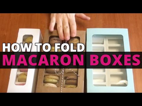 Part of a video titled How to Fold Our Macaron Cookie Boxes | Nashville Wraps - YouTube