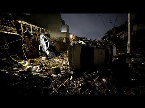 Cars damaged after floods in western Mexico | AFP