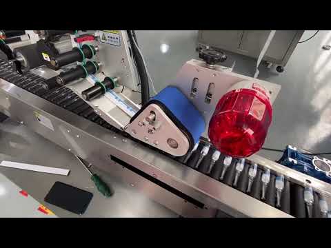 Automatic vertical horizontal tube labeling machine working video