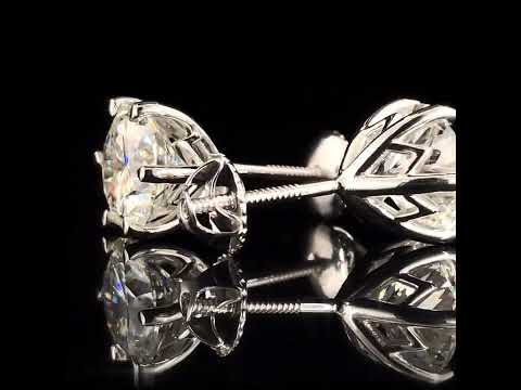 Artificial diamonds party wear diamond stud earring, 18kt