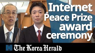 The first Internet Peace Prize Award laureates – two Japanese men, one older and one middle-aged.