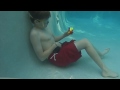 Kid Solves RUBIKS CUBE ONE HANDED UNDERWATER While Holding His Breath