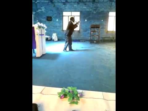 Pastor. Mwidunda  preaching in Iringa  Tanzania