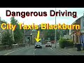 Blackburn speeding City taxis Overtakes learner on a crossing on a bend with school bus oncoming