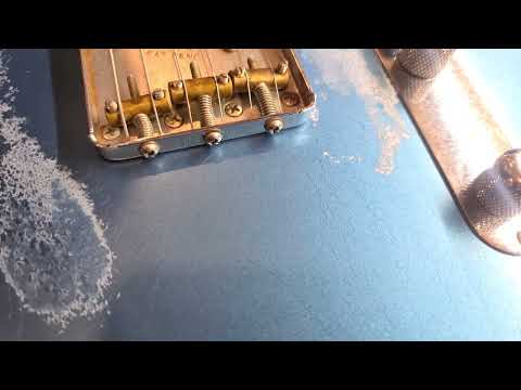 Finish checking on nitrocellulose lacquer  Fender Telecaster
