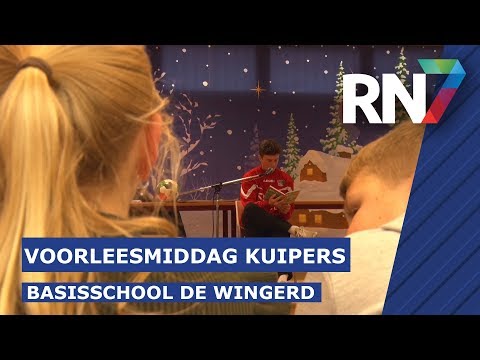 NEC'er Bas Kuipers leest voor op basisschool de Wingerd