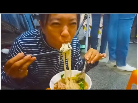 Breakfast At Market - Eating Noodle And Short Noodle Soup With Pork Intestine And Beef Balls
