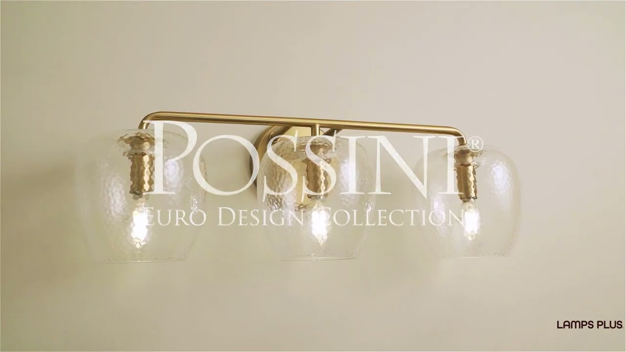 Video 1 Watch A Video About the Possini Euro Mabel Aged Brass Glass 3 Light Bath Light