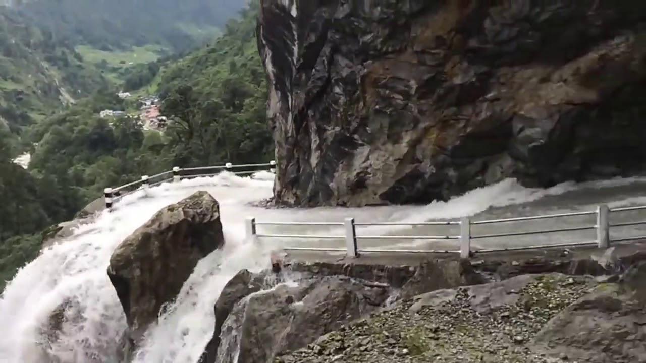 Dangerous Waterfall and Road in Nepal thumnail