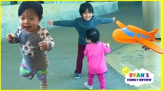 Twin Babies running away from Ryan at the airport!