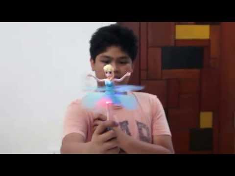Ryle with a Disney Frozen Flying Elsa Fairy Doll