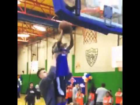 Kristaps Porzingis playing kids charity Garden of Dreams Foundation Knicks