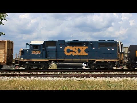 CSX GP38-2 (mid-train) heads west @ Livonia w/ CSX Local D738 + Caboose