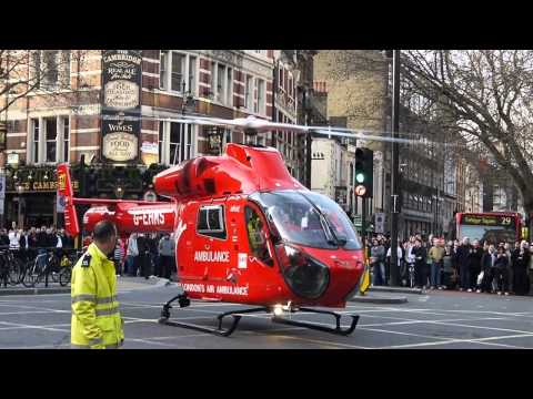 London Air Ambulance taking off from Cambridge Circus, Soho, London
