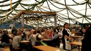 Pretty much every thirty seconds, they start playing this song and everyone sings along at a deafening volume. You don't entirely know what the words are, because everyone is slurring them. You abandon your typical aversion to singing in public and go along with it. It's better than trying to strike up a conversation with these drunk people.