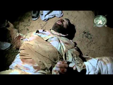 جثة قيادي من حزب الله قتل بمعارك مدينة يبرود في ريف دمشق على يد مقاتلي القيادة العسكرية الموحدة في القلمون