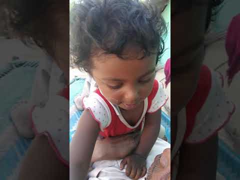 Cute Baby is listening to Lori sitting on Nana's stomach and smiling and dancing cute beby Pragya