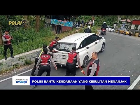 TIM DROGBAN POLRES MAGETAN BANTU KENDARAAN DI TANJAKAN SARANGAN&ndash;CEMORO SEWU