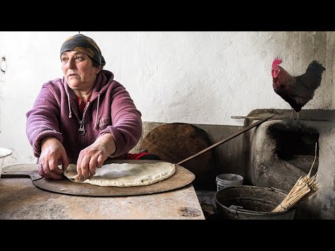 , title : 'Traditional Lezgi dishes in an old Street Oven. Life in Dagestan village. Russia'