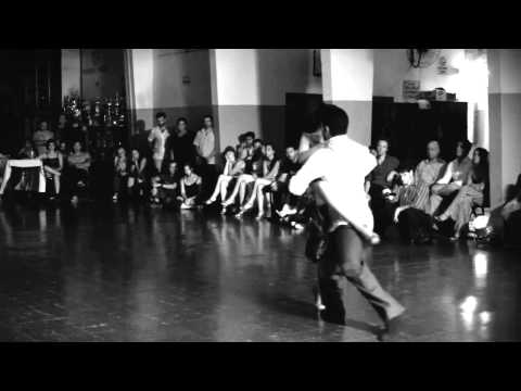  Sabrina Veliz  and  Ruben Veliz  are  dancing  to  a  nontraditional song  at  Rosario Tango Festival  in  2015