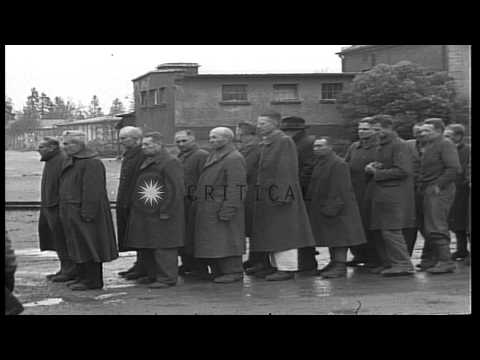 Prisoners including a young boy at Dachau Concentration Camp in Germany. HD Stock Footage