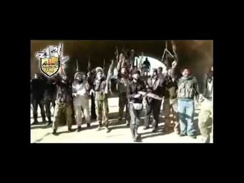 مجموعة من مقاتلي لواء الإسلام وحركة أحرار الشام يعلنون في بيان السيطرة على مطار الجراح العسكري في ريف حلب